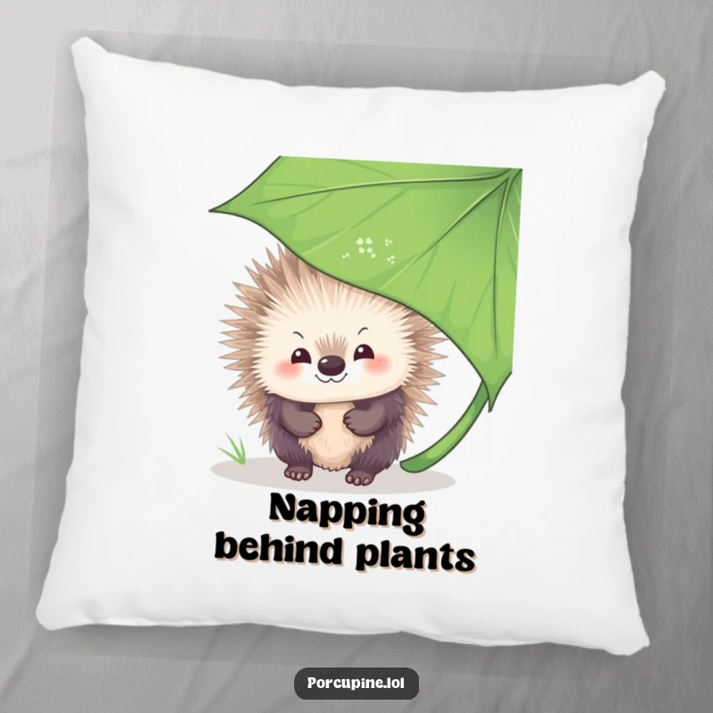 Funny Pillow featuring a porcupine with a shy, sweet smile, peeking from behind a large leaf, offering a sense of quiet comfort.