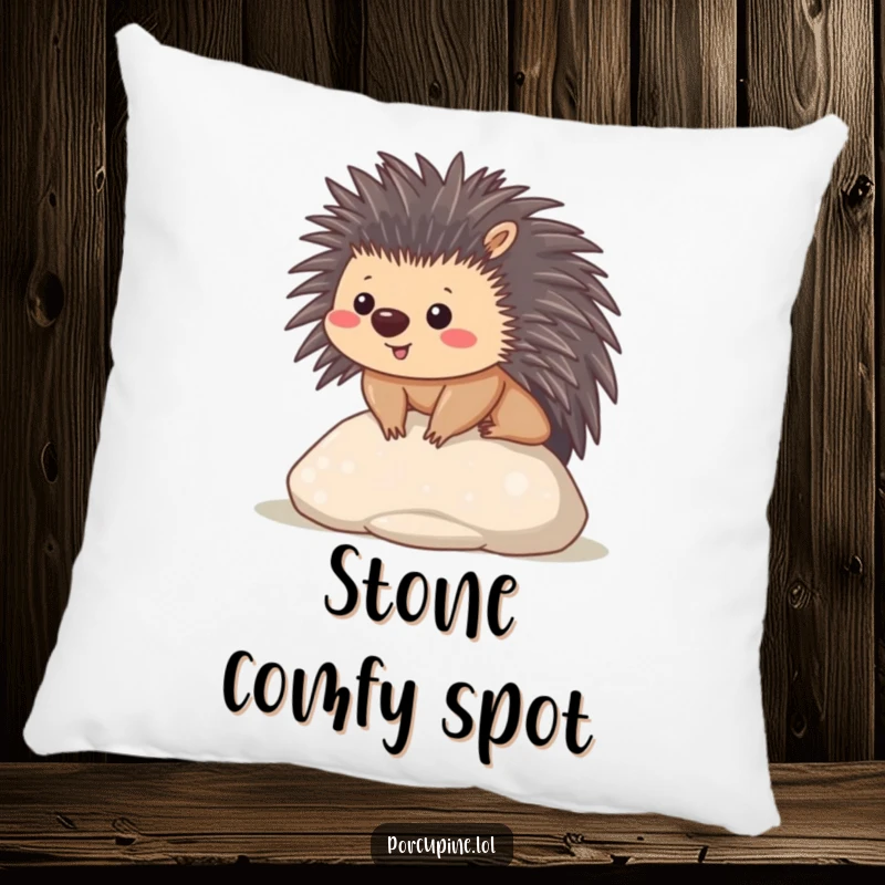 Funny pillow featuring a content kawaii porcupine sitting on a smooth stone, a soft and peaceful accent for any room.