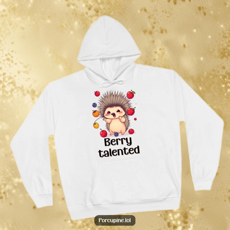 Funny hoodie featuring a porcupine skillfully juggling colorful berries with its quills, perfect for cozy days and lively conversations.