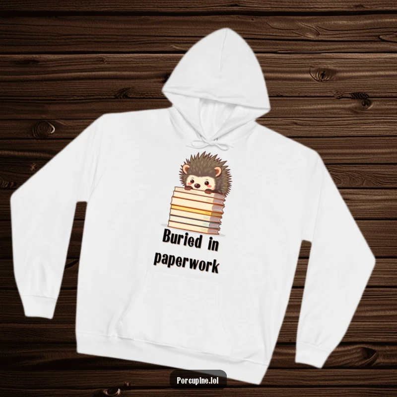 Funny hoodie featuring a porcupine peeking over a towering stack of papers, embodying cozy work-from-home struggles.