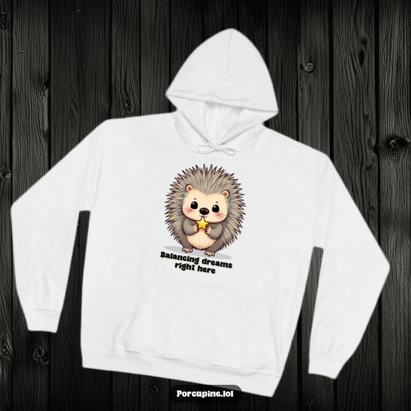 Funny Porcupine Hoodie: A warm pullover featuring a porcupine balancing a tiny, shimmering star on its nose, perfect for dreamers and humor lovers.