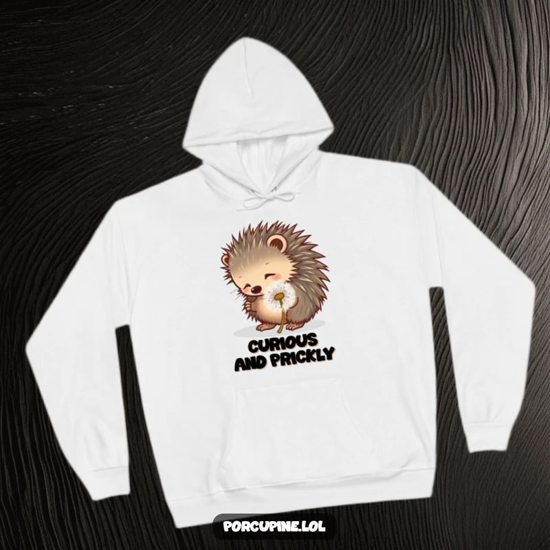 Funny porcupine hoodie depicting a porcupine playfully poking a rolling dandelion puff, offering cozy and whimsical humor.