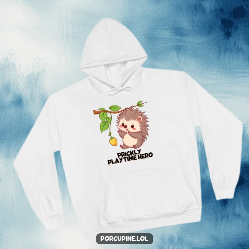 Funny hoodie featuring a kawaii porcupine engaged in playful batting at a dangling vine, radiating cheerful energy.