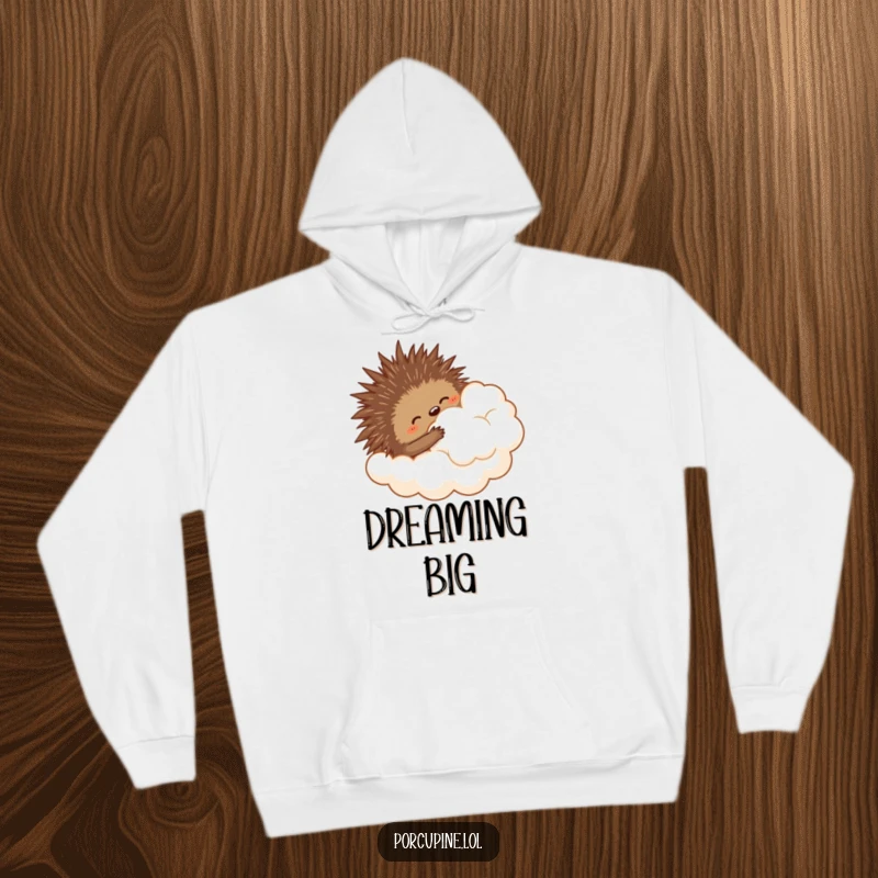 Funny hoodie design of a porcupine comically embracing a soft cloud, capturing a moment of sweet, clumsy ambition.