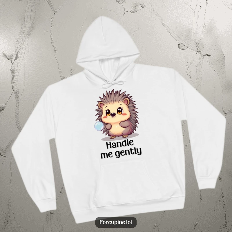 Funny Hoodie showcasing a porcupine with big, astonished eyes, captivated by the beauty of a single, iridescent bubble drifting gently.