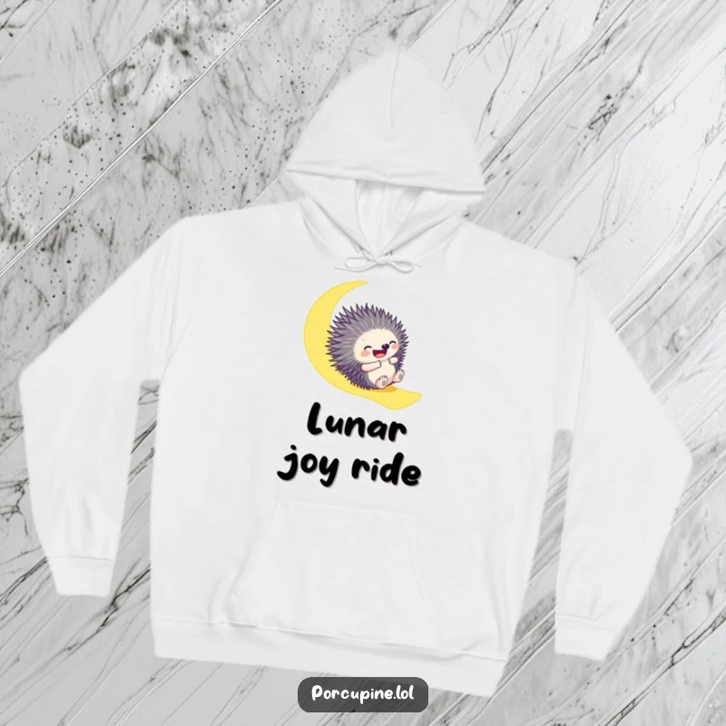 Funny hoodie with a porcupine gleefully sliding down a bright moonbeam, offering warmth and whimsical nighttime charm.