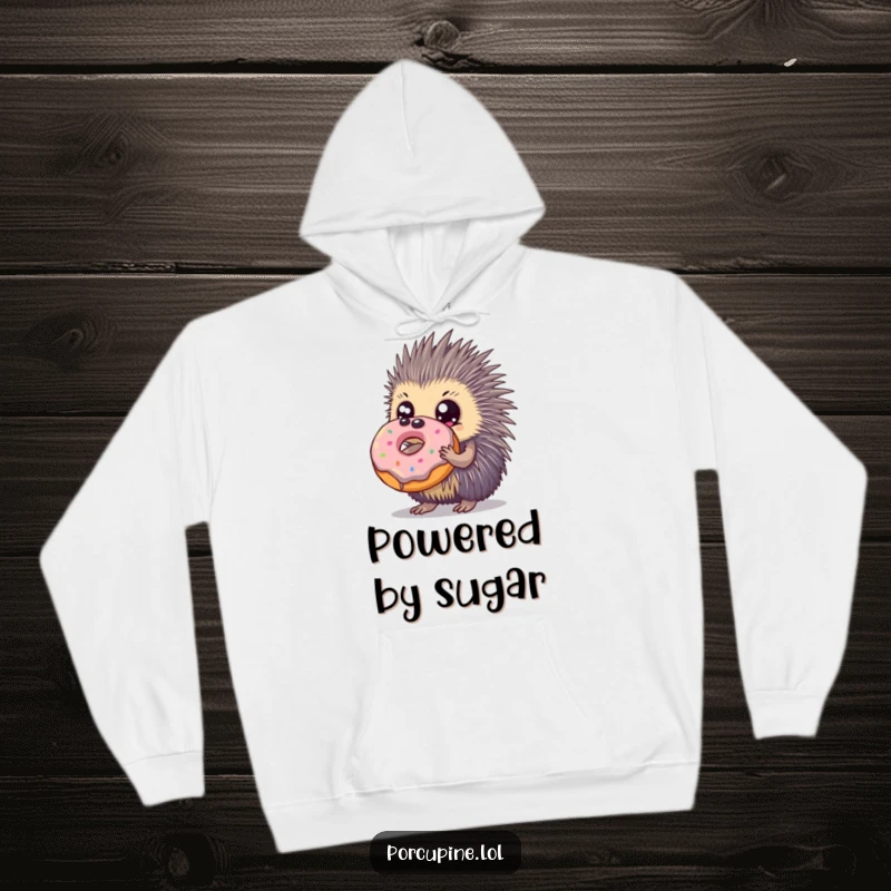 Funny hoodie with a porcupine sporting huge eyes, happily embracing a very large donut, perfect for comfort and cravings.