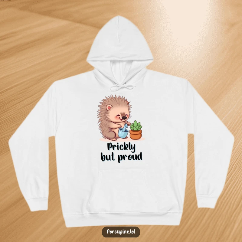 Funny hoodie graphic of a happy porcupine carefully watering a small succulent plant with a miniature watering can.