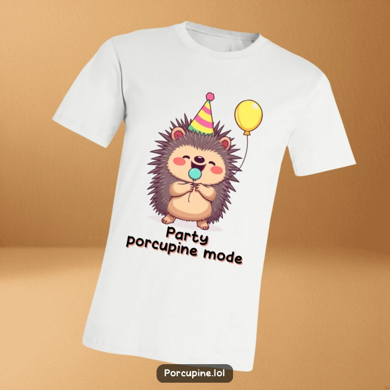 Funny porcupine t-shirt with a party hat, gleefully popping a tiny balloon with enthusiasm.