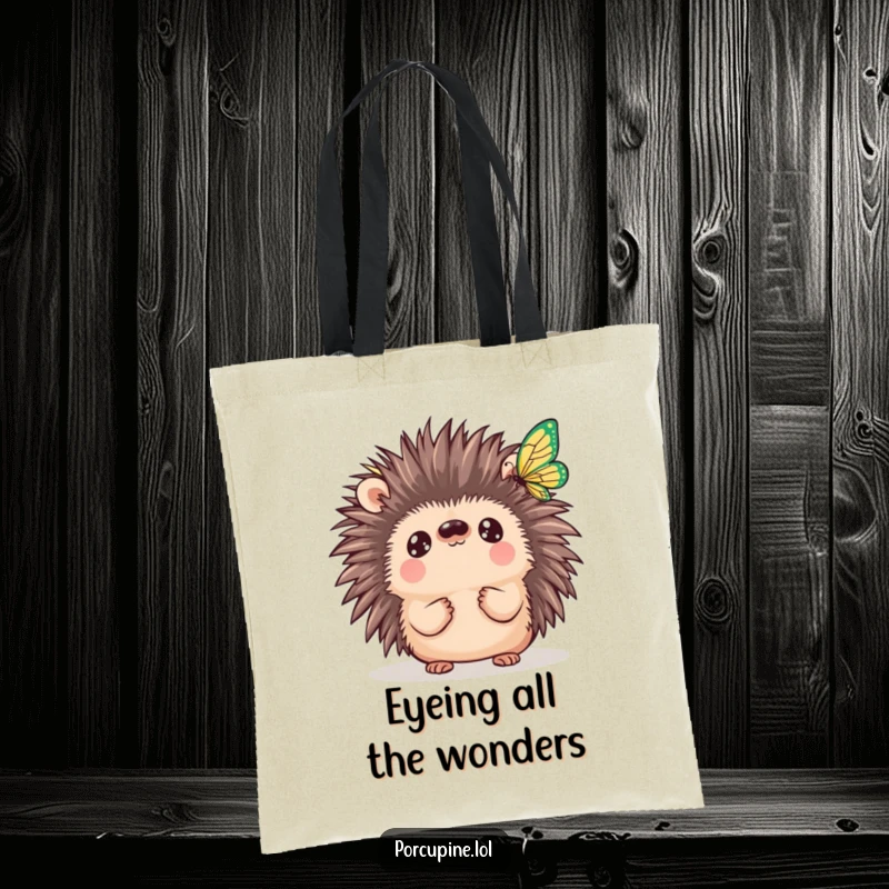 Funny Kawaii Porcupine Tote Bag: Shows a wide-eyed porcupine captivated by a fluttering butterfly, blending nature's beauty with prickly charm.